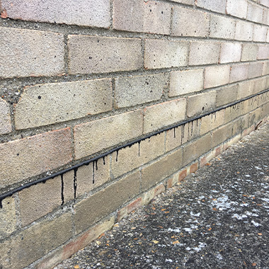 Damp proof course that has been added between brick layers