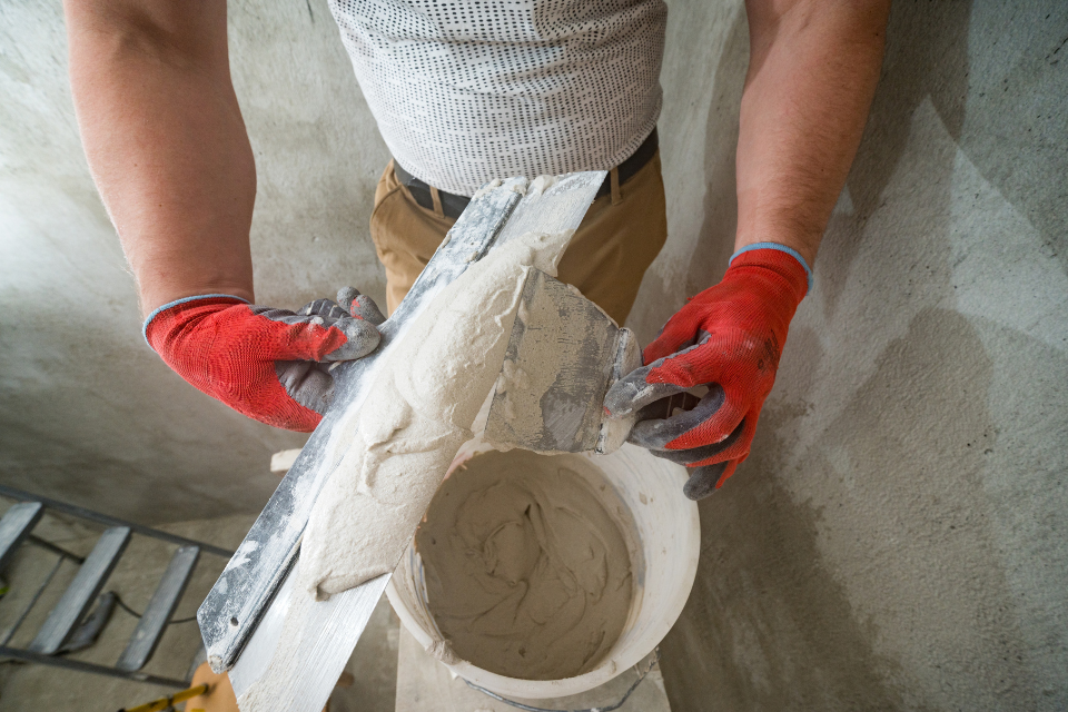 Lime plaster with a hawk and trowel