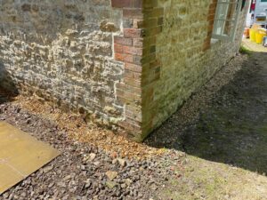 20mm shingle in the external trench, covering the Geo-Drain