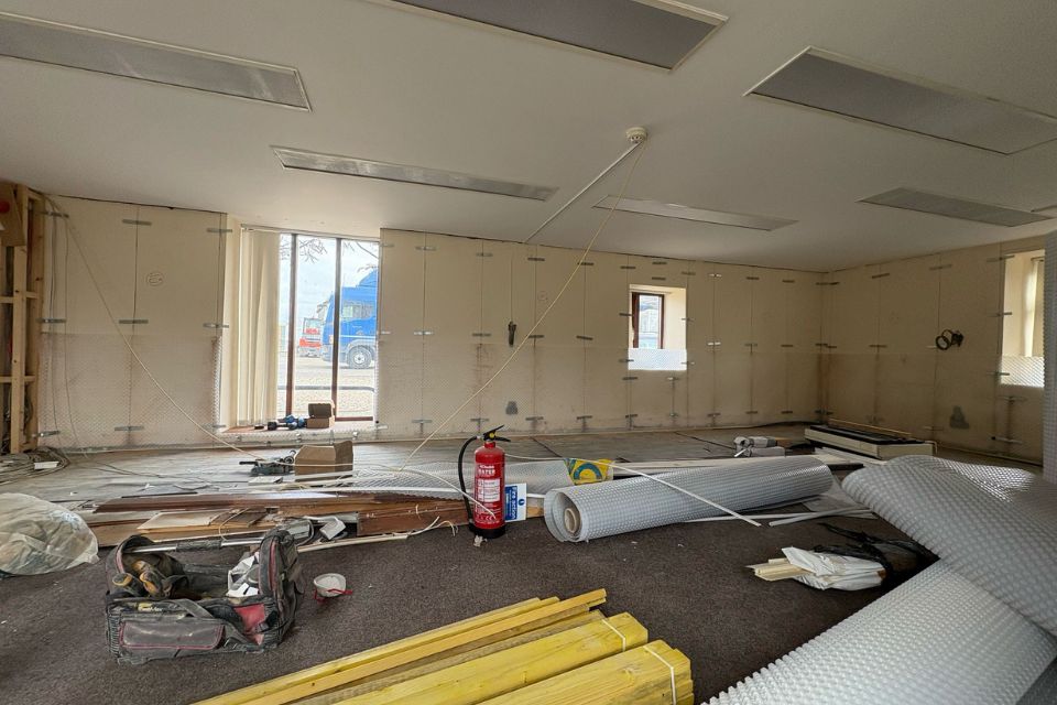 The main room of the agricultural building conversion with waterproofing membrane ready to be installed