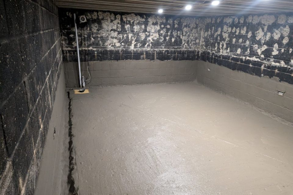 The basement conversion stripped back to the bare walls with Polysil floor sealant applied