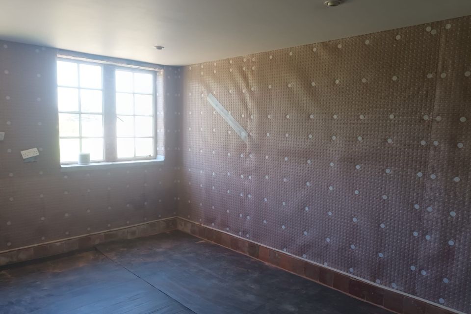 A full height wall membrane for waterproofing
